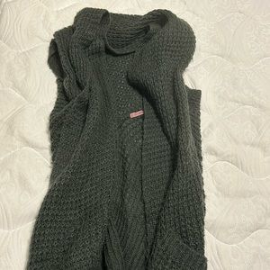 Small, grey, flowy, chunky cardigan.